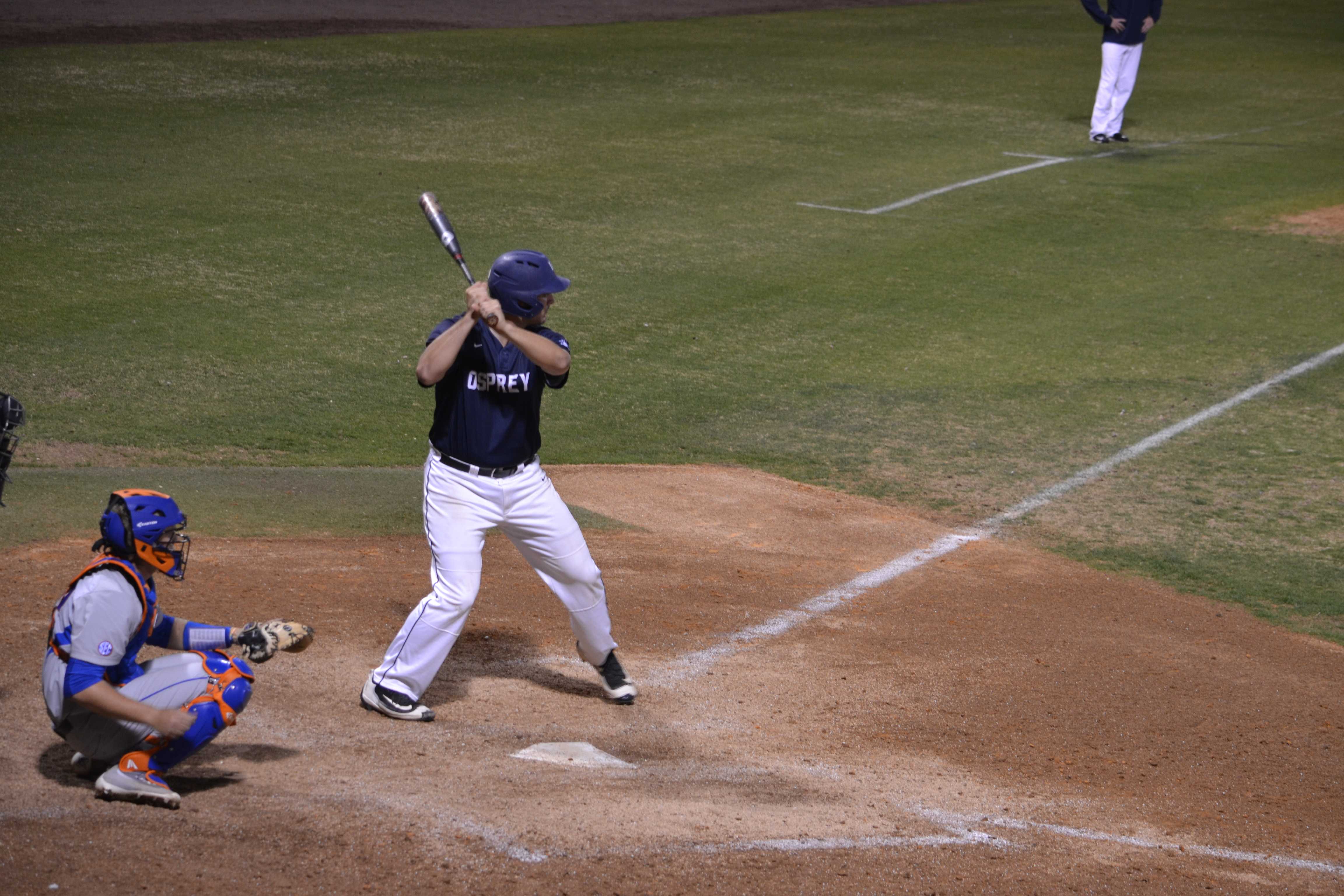 Corbin Olmstead looks on during an at-bat against the University of Florida. Photo by Emily Woodbury
