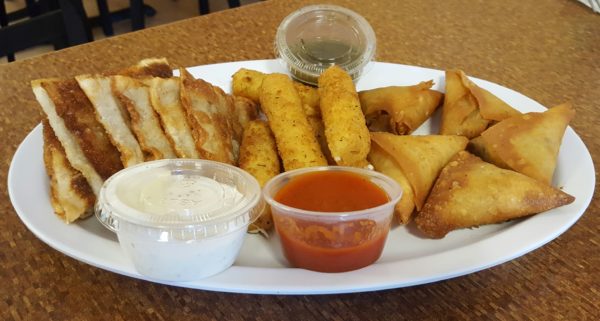 The appetizer combo allows customers to explore Afghan cuisine through three different appetizers. Photo by Courtney Strngfellow.