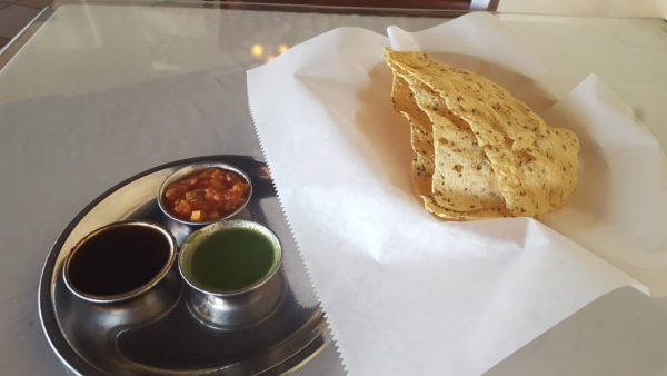 Papad, which is made from a chickpea flour, is a great base for trying different chutneys. Photo by Courtney Stringfellow 