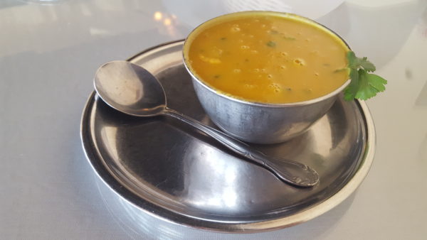 Even in the summer, creamy lentil soup is a relaxing dish to prepare customers for their main meals. Photo by Courtney Stringfellow 
