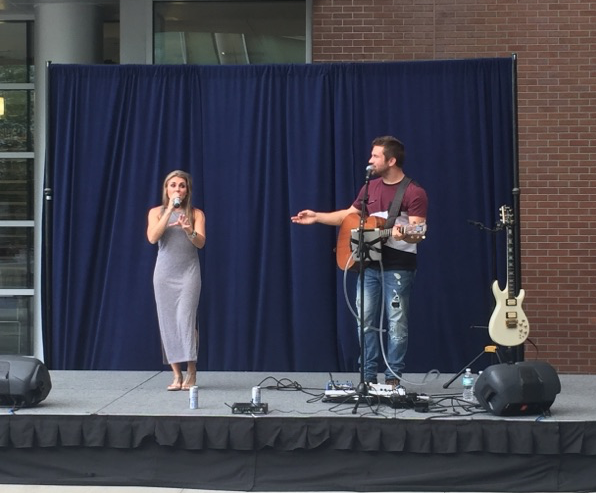 Country duo Dave and Whitney take the stage during the Summer B Cookout. Photo by Audrey Carpenter