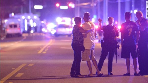 Family members being evacuated from the scene of the shooting. Photo courtesy of CNN.