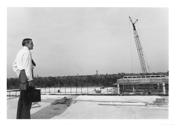 Dr. Carpenter stands on the roof of Building 1, during construction in 1972. Photo courtesy of UNF archives.