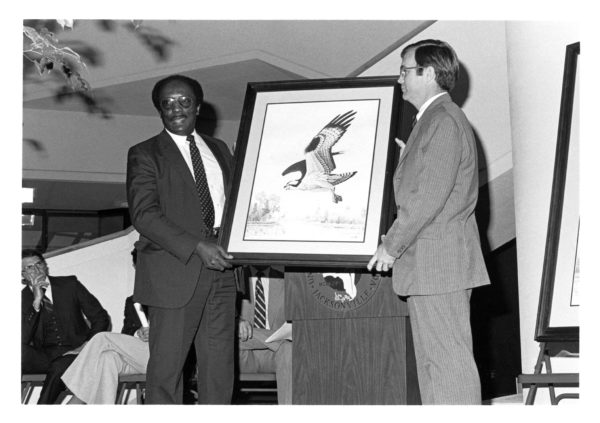 President Robinson at unveiling of UNF Osprey art print, March 1981, Library Atrium. L-r: Andrew Robinson, W.A. McGriff III