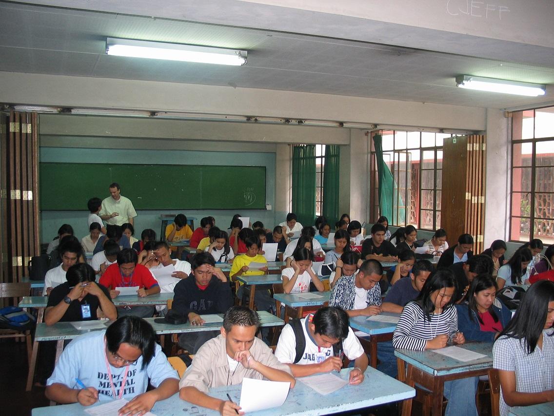 Students in Baguio City, Philippines fill out a survey. Photo courtesy Dominik Guess