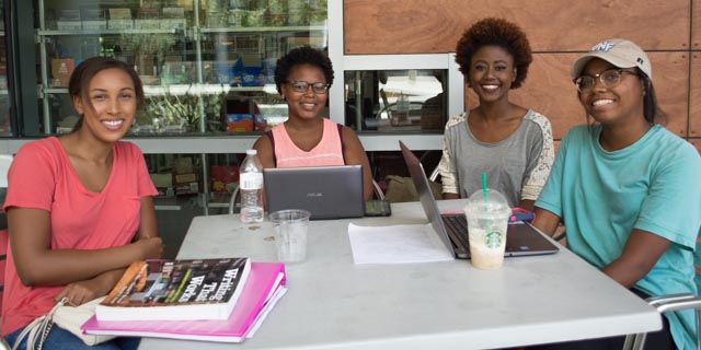 Left to right: Sherane Chen is a junior communications major, Janae Petty is a junior elementary education major, Frisberdine Jules is a junior biochemistry major and Sharon Bradley is a sophomore elementary education major. Photo by Lili Weinstein. 