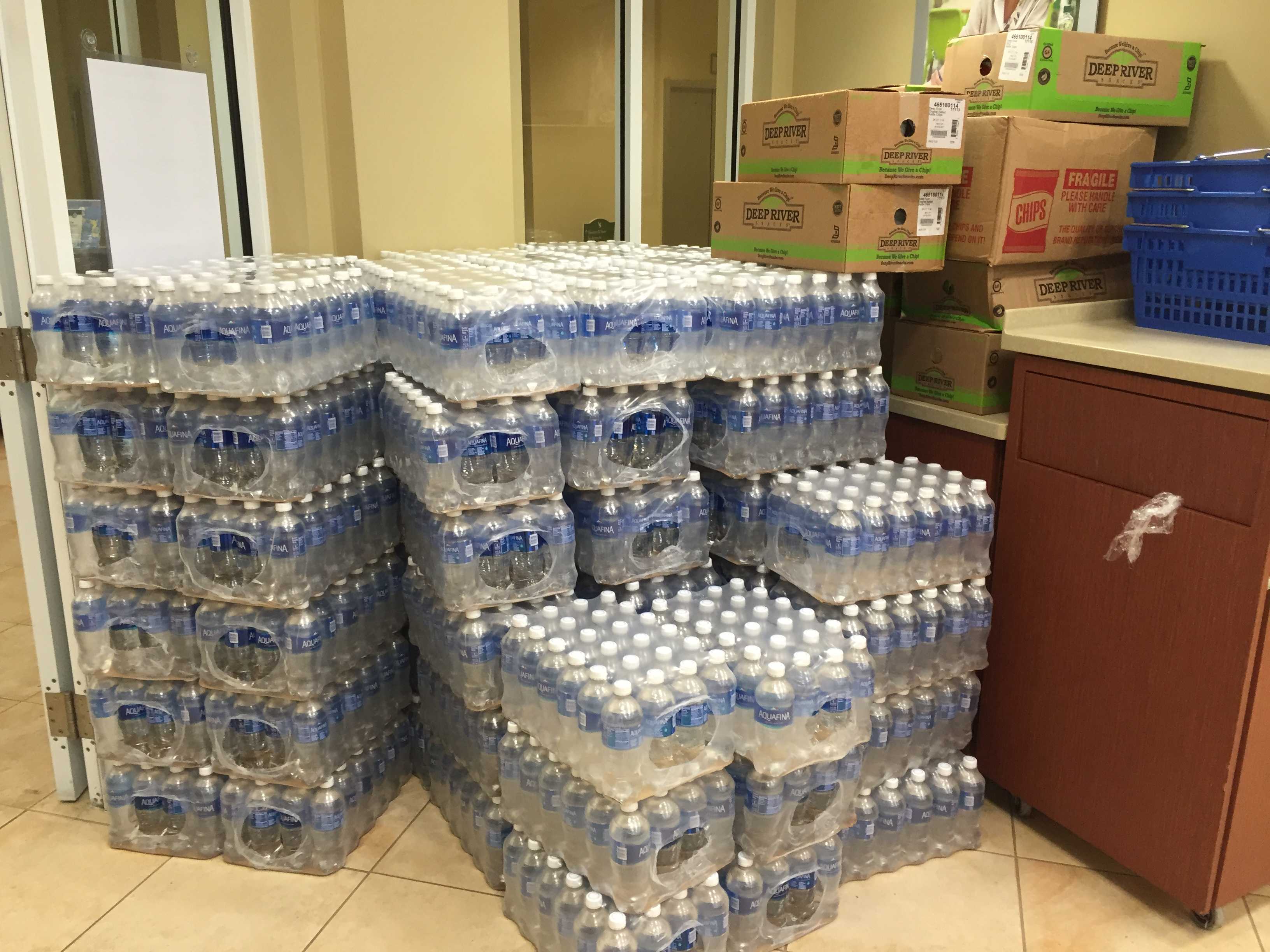 Supplies are piled up outside of Ozzie's in preparation for all UNF residents to evacuate to the Fountains. Photo by Nick Blank