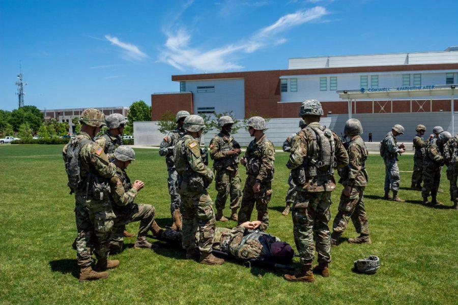 The Army ROTC learning how to rescue an injured soldier when in the feild.