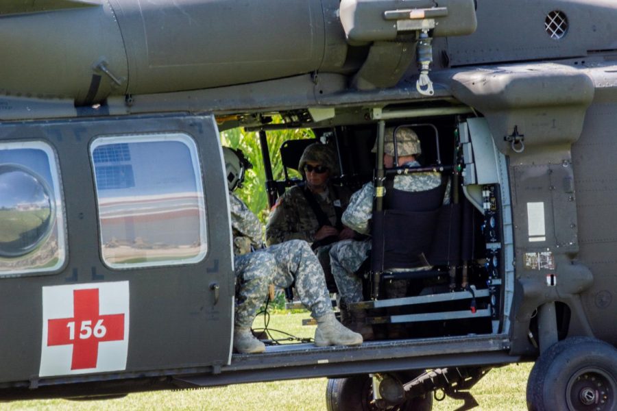 Soldiers learning how to enter and leave the 'incoming' Blackhawk Helicopter.