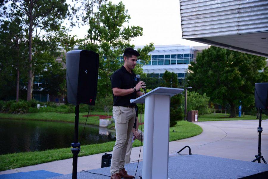 Seth Pearson speaking at a vigil for Hayden Raulerson.
