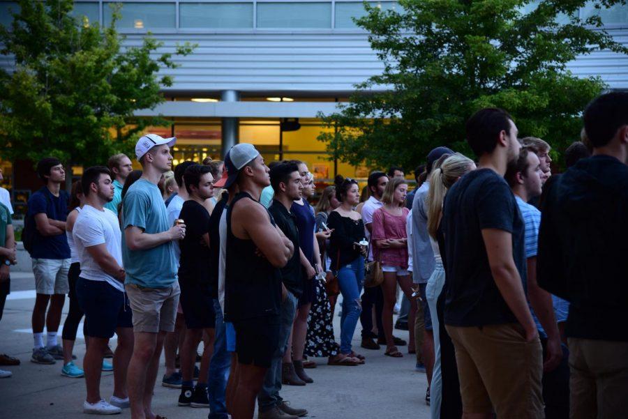 Students come together at a vigil for 20-year-old Hayden Raulerson.
