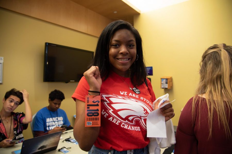 A student wearing a MSD shirt along with an "NRA price tag." The tag is for 1.18 million dollars, the amount of money politicians receive from the NRA.