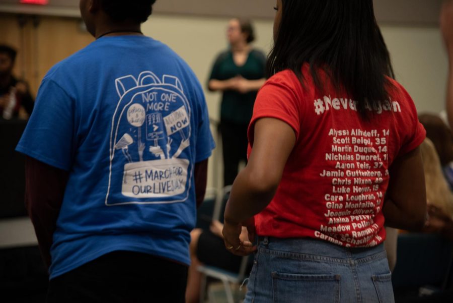 Two activists wear shirts in support of March for Our Lives and Marjory Stoneman Douglas 