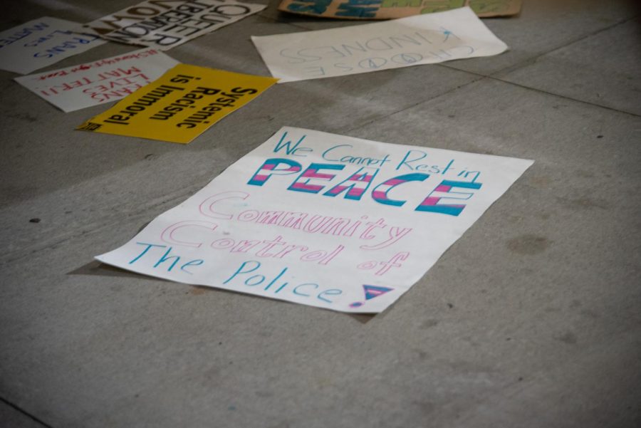 A sign in support of trans lives.