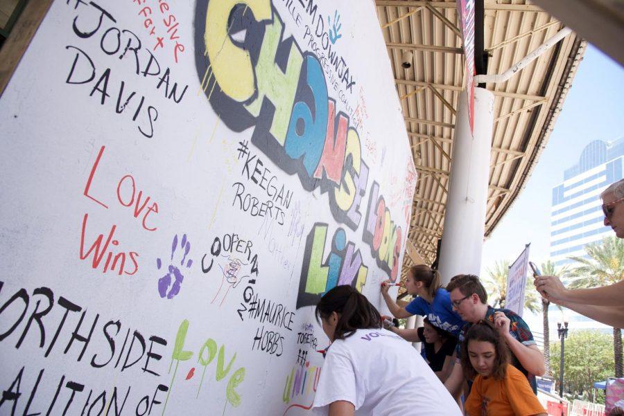 Attendees add their own thoughts to the "Change Looks Like" board.