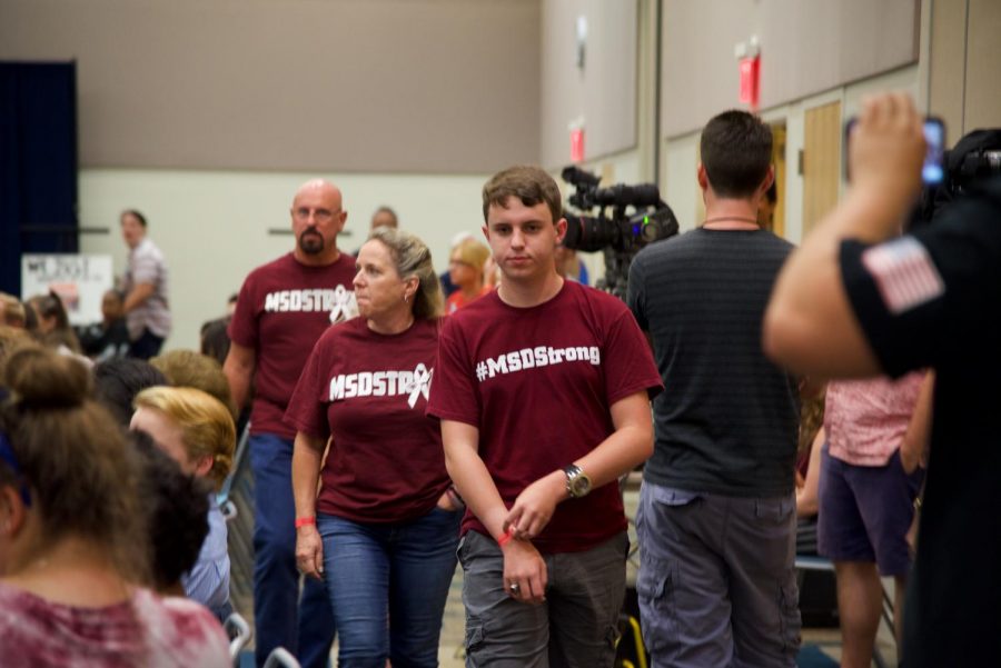 Marjory Stoneman Douglas High School student and parents walking into the town hall meeting.