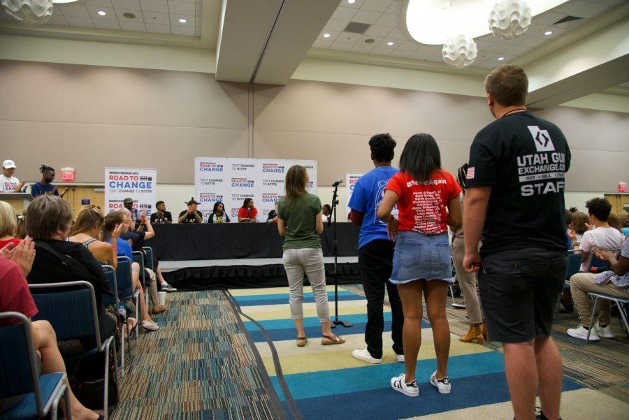 Attendees wait in line to ask the Road to Change panel questions.