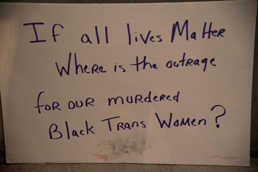 Sign stating "If all lives matter where is the outrage for our murdered black trans women?"