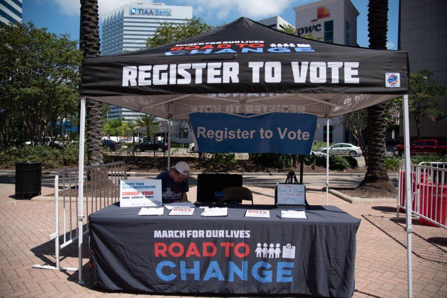 Activists at the Road to Change: Jax encourage others to register to vote.