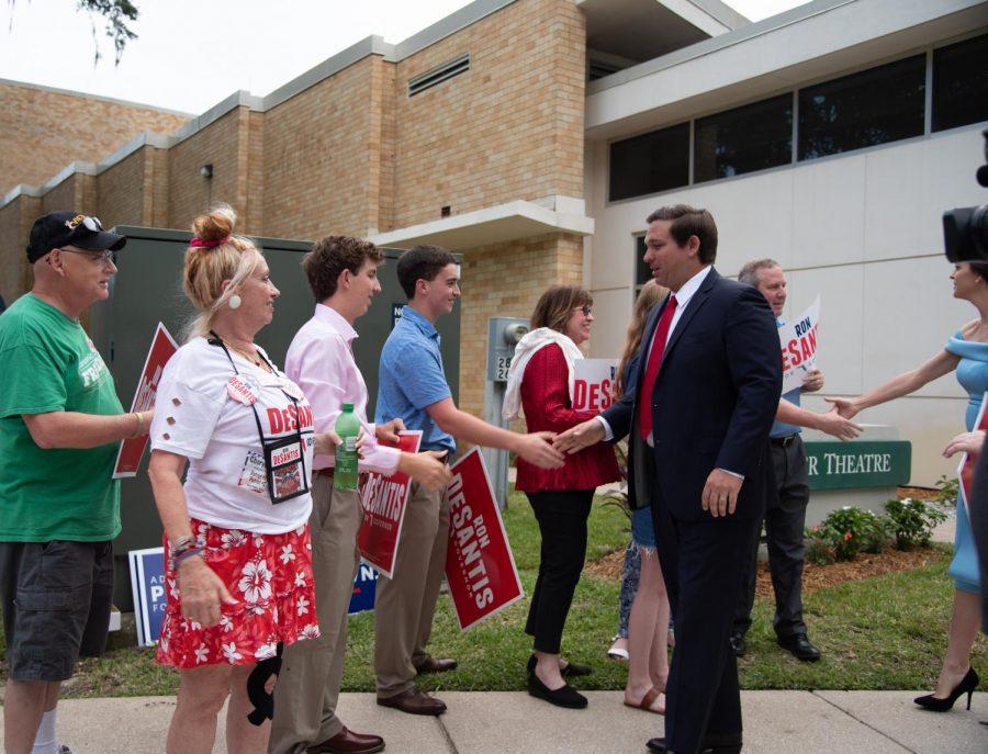 Ron DeSantis greets his supporters at Jacksonville University on August 8.