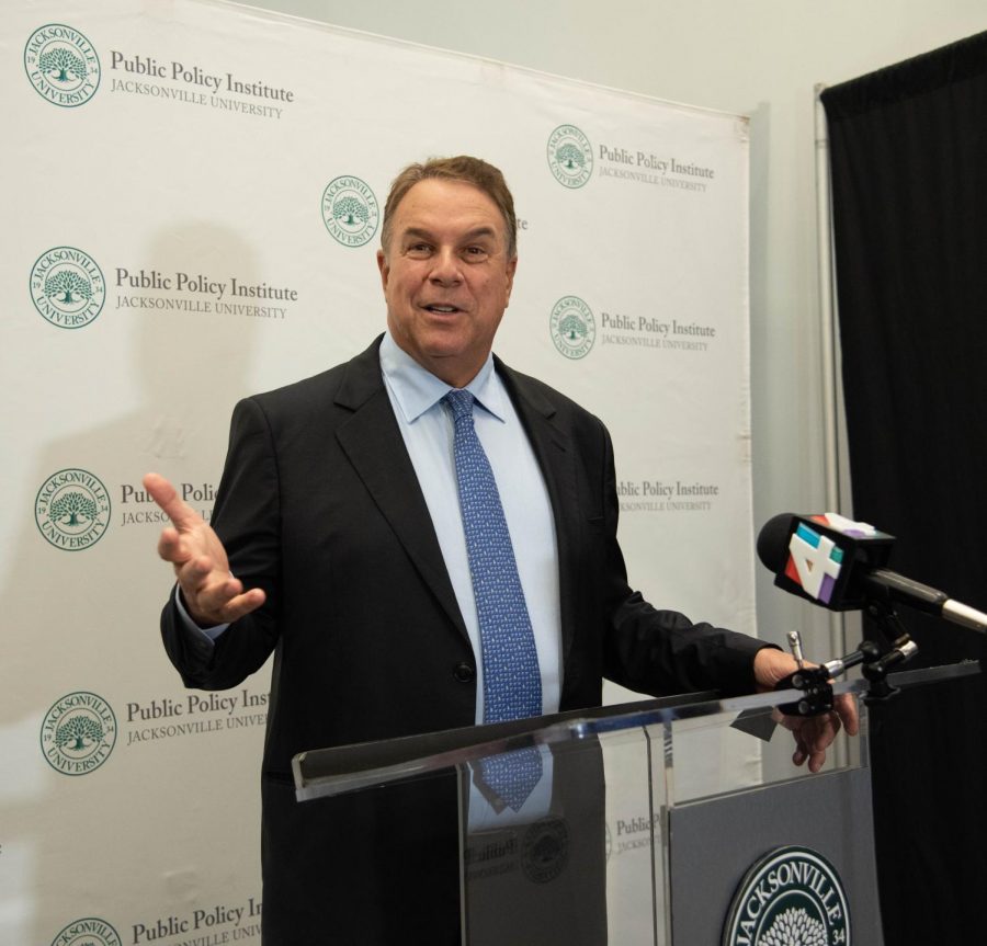Jeff Greene answers press questions after his interview during the Town Hall Forum.