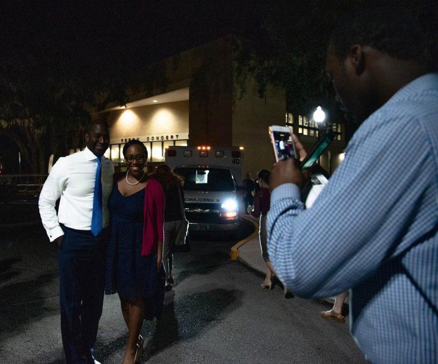 Andrew Gillum posing for a picture with a supporter after tonight's Town Hall Forum.