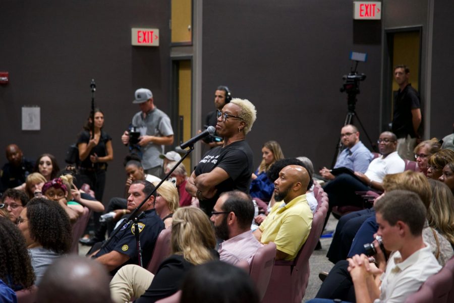 Attendee expressing their feelings and questions to the panel.