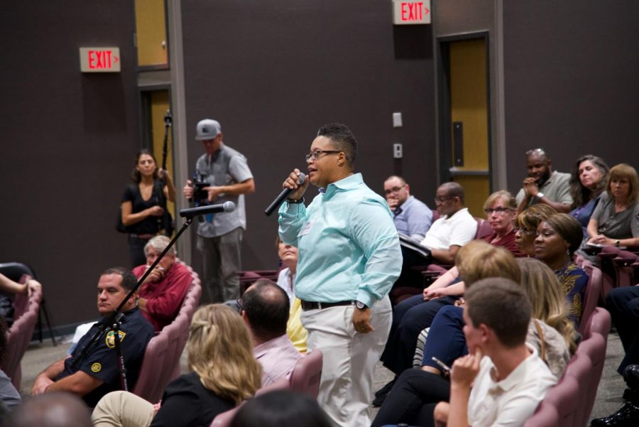 Attendee expressing their feelings and questions to the panel.