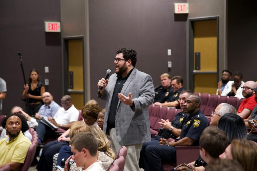 Attendee expressing their feelings and questions to the panel.