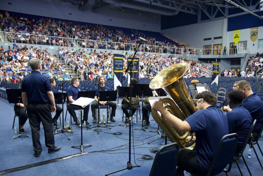 Part of the UNF band preparing to play as graduates enter the arena.