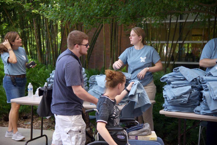Students receiving the new market day shirts.
