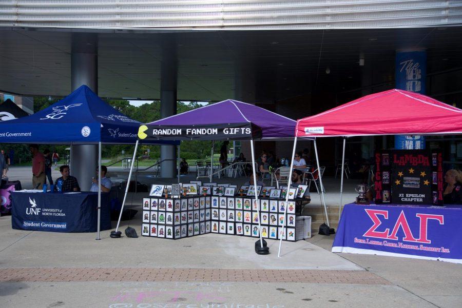 Tabling for market day by various groups.