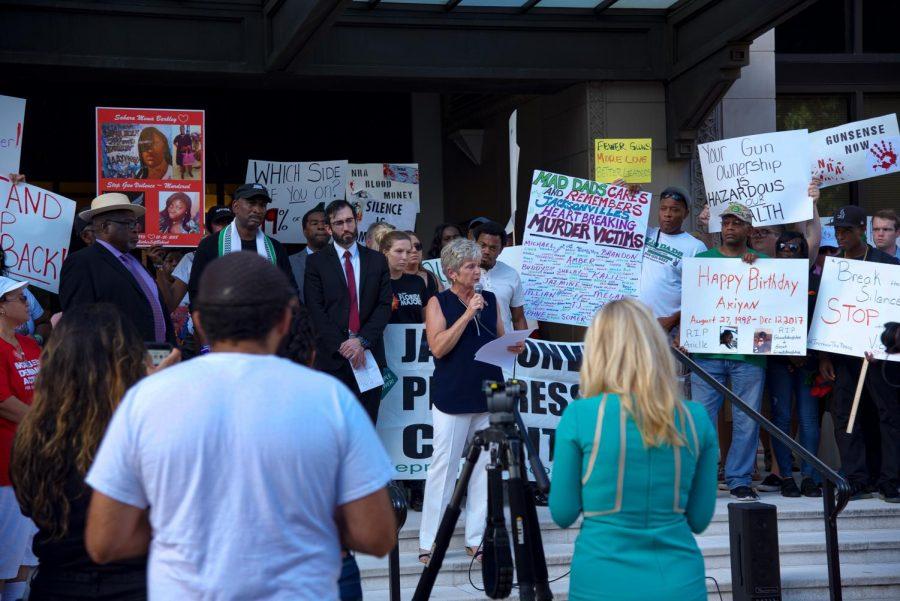  Peaceful protesters gather outside City Hall.