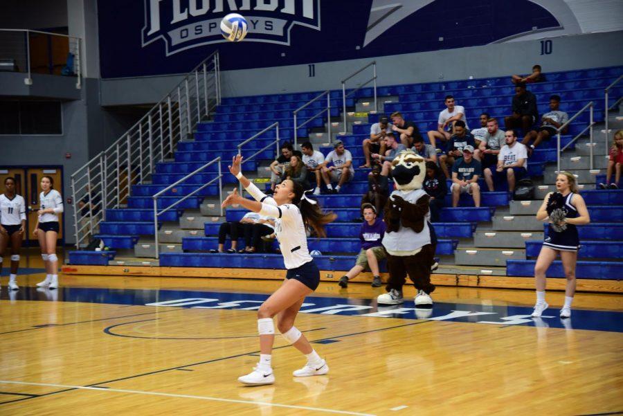 Redshirt-Sophomore Gabby O'Connell serves one up during a match. 