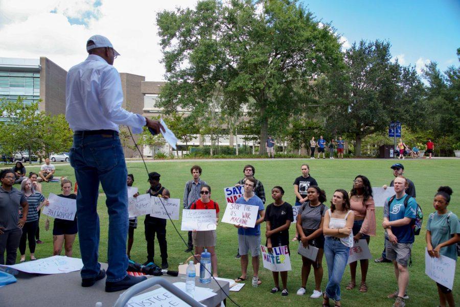 Guest speaker speaking at event.