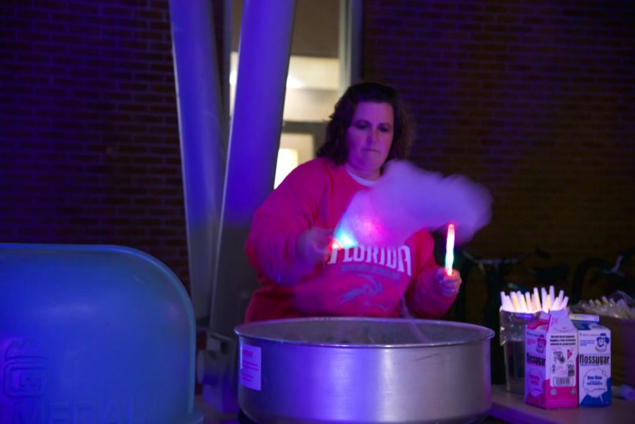 Woman making cotton candy