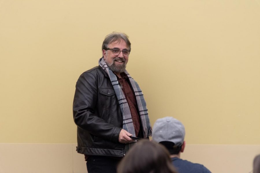 Mark Ari, one of the authors in the collection and a professor of creative writing at UNF, read his passage of the novel.
