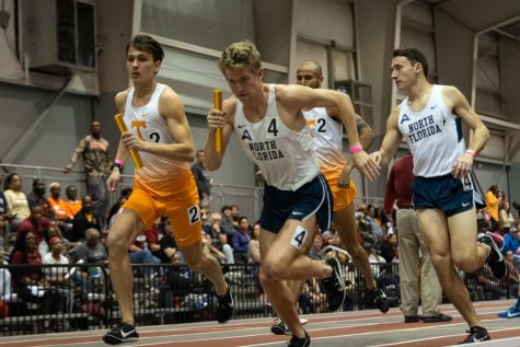 Junior Noah Perkins races after receiving the baton.