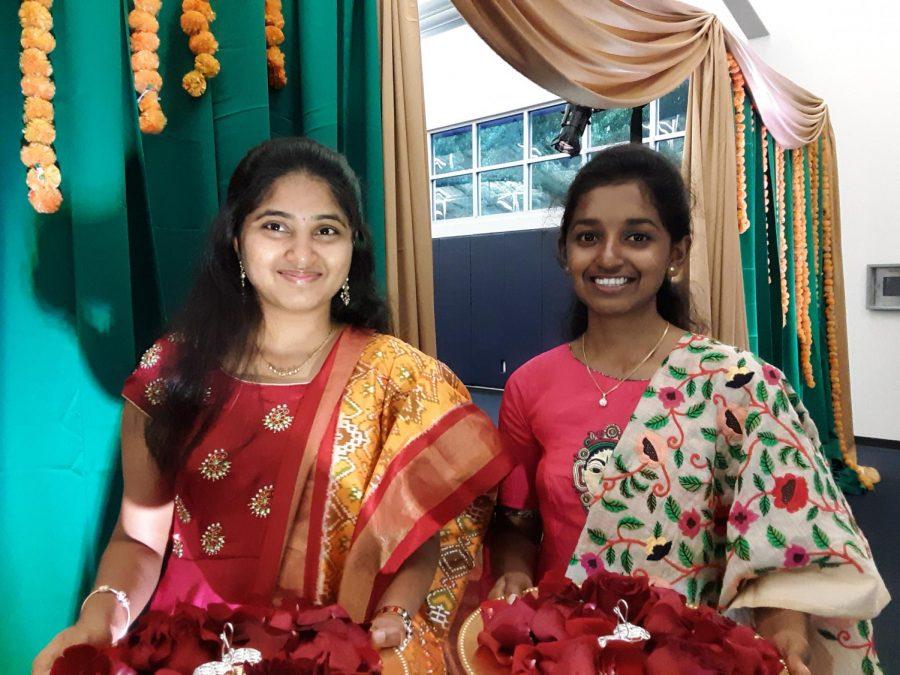 The first dancers of the evening, Annie Thomas and Sai Spurthi Ravi, greeted guests by placing bindi red dots on their foreheads.