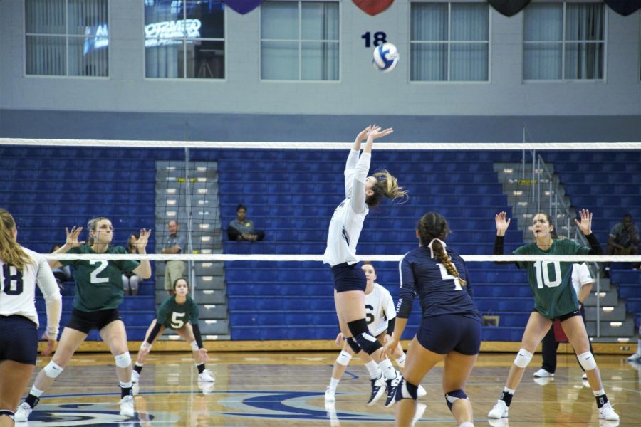 Julianna Askew sets the ball for a teammate