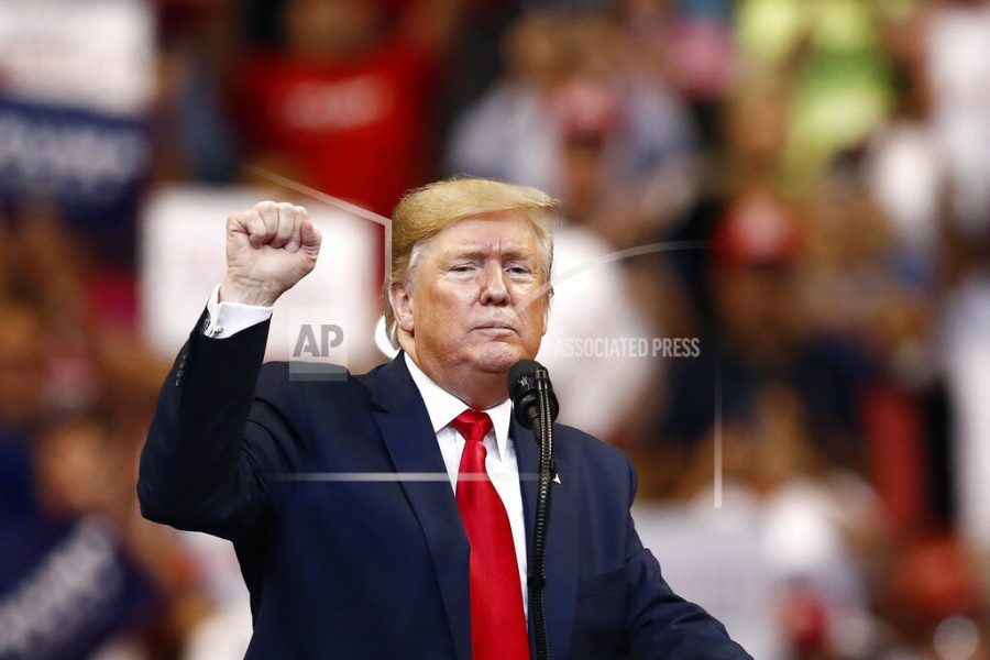 President Donald Trump gestures after speaking at a campaign rally Tuesday, Nov. 26, 2019, in Sunrise, Fla. (AP Photo/Brynn Anderson)