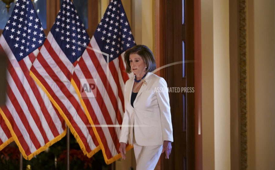 Speaker of the House Nancy Pelosi, D-Calif., arrives to make a statement at the Capitol in Washington, Thursday, Dec. 5, 2019.  Pelosi announced that the House is moving forward to draft articles of impeachment against President Donald Trump. (AP Photo/J. Scott Applewhite)