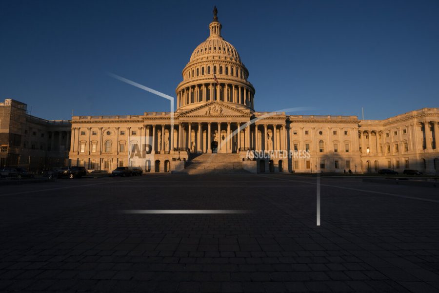 The Capitol is seen in Washington, early Wednesday, Dec. 18, 2019. President Donald Trump is on the cusp of being impeached by the House, with a historic debate set Wednesday on charges that he abused his power and obstructed Congress ahead of votes that will leave a defining mark on his tenure at the White House. (AP Photo/J. Scott Applewhite)