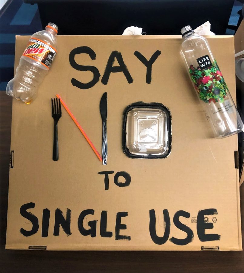 Environmental club promotes reduction of single-use plastic with creative signs