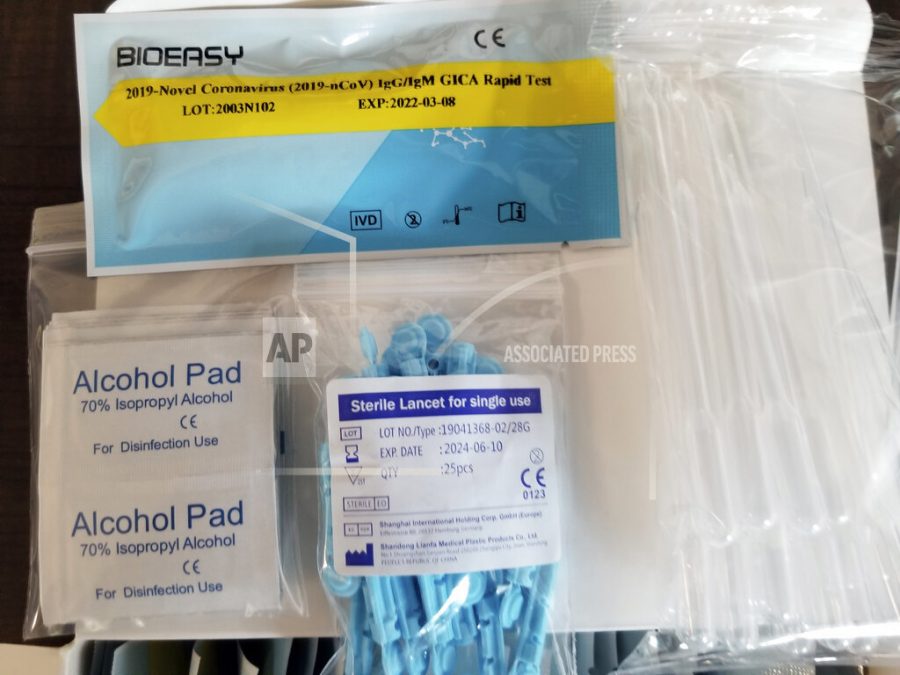 In this image provided by the U.S. Immigration and Customs Enforcement, this March 24, 2020, photo, shows unapproved COVID-19 tests that were seized on March 22, 2020 from the DHL Express Consignment Facility at JFK Airport in the Queens borough of New York. Federal officials say the COVID-19 outbreak has unleashed a wave of fraud. An arm of the Department of Homeland Security, Homeland Security Investigations, has opened more than 300 cases in recent weeks that include counterfeit products and medicines as well as fake tests for the virus.  (U.S. Immigration and Customs Enforcement via AP)