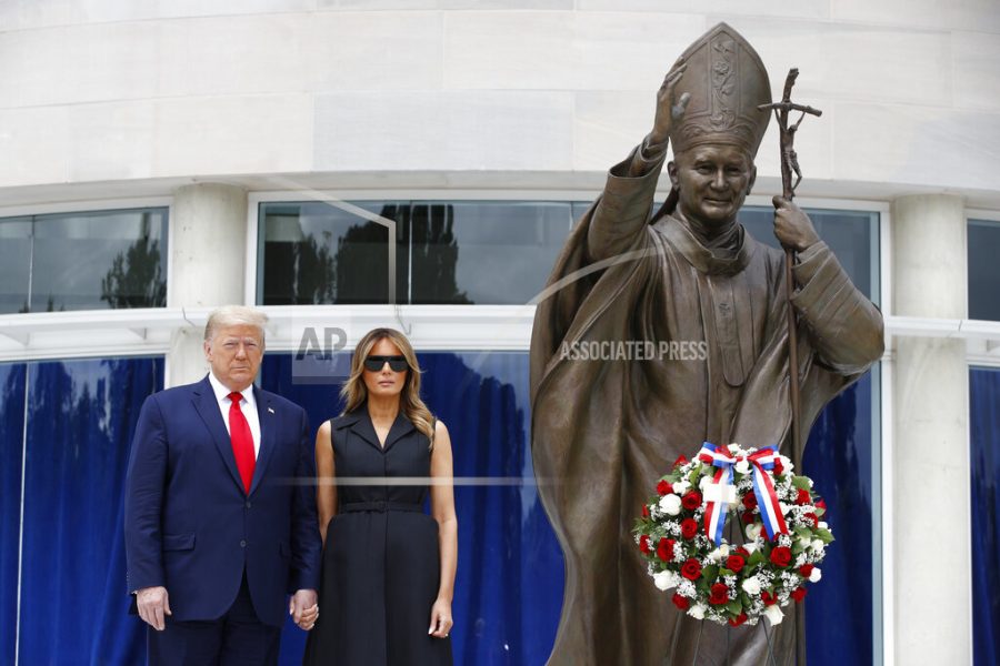 President Donald Trump and first lady Melania Trump visit Saint John Paul II National Shrine, Tuesday, June 2, 2020, in Washington. (AP Photo/Patrick Semansky)