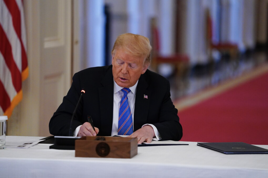 The executive order was signed at a meeting with the American Workforce Policy Advisory Board