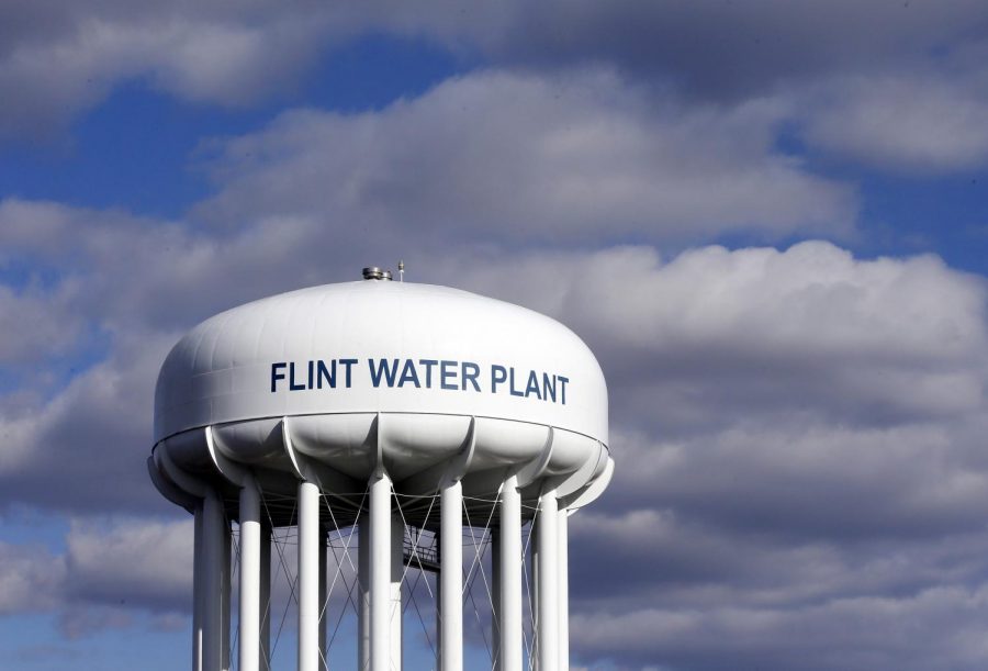 In+this+March+21%2C+2016%2C+file+photo%2C+the+Flint+Water+Plant+water+tower+is+seen+in+Flint%2C+Mich.+Michigan+Gov.+Gretchen+Whitmer+says+a+proposed+%24600+million+deal+between+the+state+of+Michigan+and+Flint+residents+harmed+by+lead-tainted+water+is+a+step+toward+making+amends.+Officials+announced+the+settlement+Thursday%2C+Aug.+20%2C+2020%2C+which+must+be+approved+by+a+federal+judge.+%28AP+Photo%2FCarlos+Osorio%2C+File%29