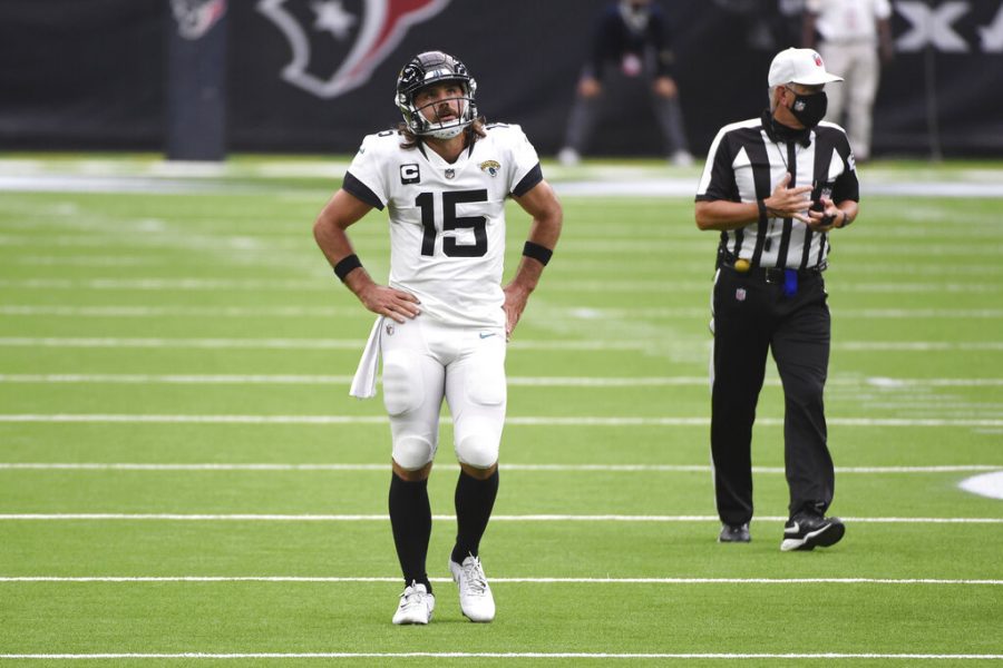 Jacksonville Jaguars quarterback Gardner Minshew (15) walks off the field after failing to make a first down against the Houston Texans during the second half of an NFL football game Sunday, Oct. 11, 2020, in Houston. (AP Photo/Eric Christian Smith)
