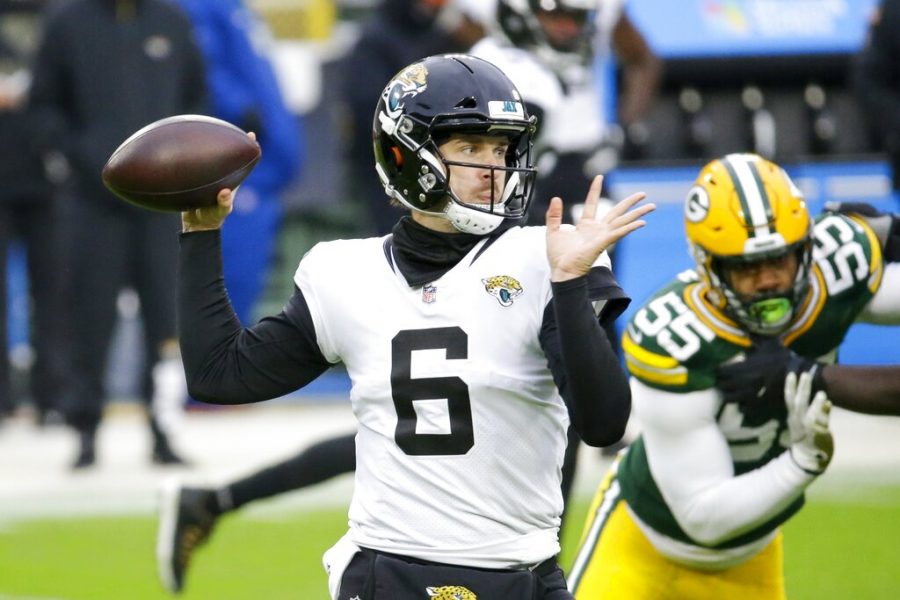 Jacksonville Jaguars' Jake Luton throws during the first half of an NFL football game against the Green Bay Packers Sunday, Nov. 15, 2020, in Green Bay, Wis. (AP Photo/Mike Roemer)